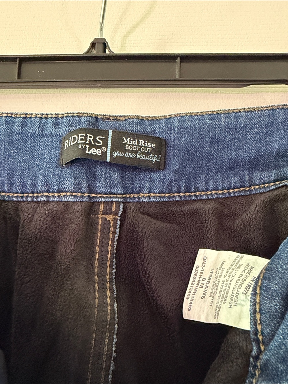 Riders by Lee Mid-Rise Boot Cut Jeans in Blue.